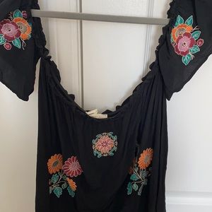 Black off the shoulder top with flowers